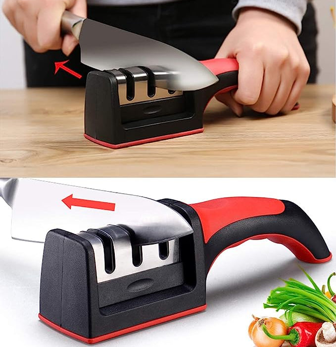 Knife sharpener being used on a knife with vegetables in the background