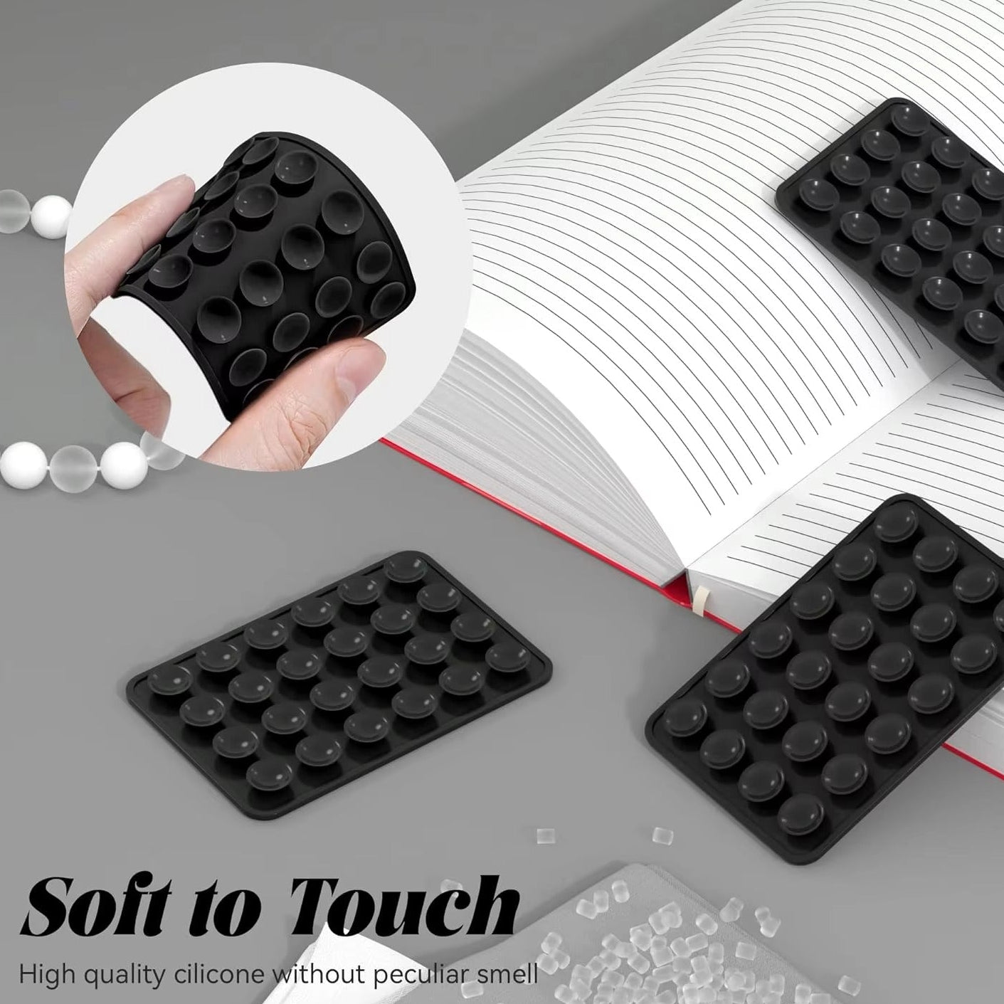 Black silicone pads with raised texture on a gray surface, with text 'Soft to Touch' and 'High quality silicone without peculiar smell'.