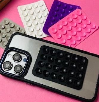 Phone case with bubble texture on a pink background